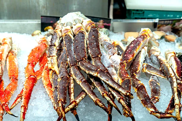Buy frozen raw red king crab legs—whole clusters, IQF and vacuum-packed for peak freshness. Perfect for grilling, boiling, or sushi prep. Wholesale & retail shipping.